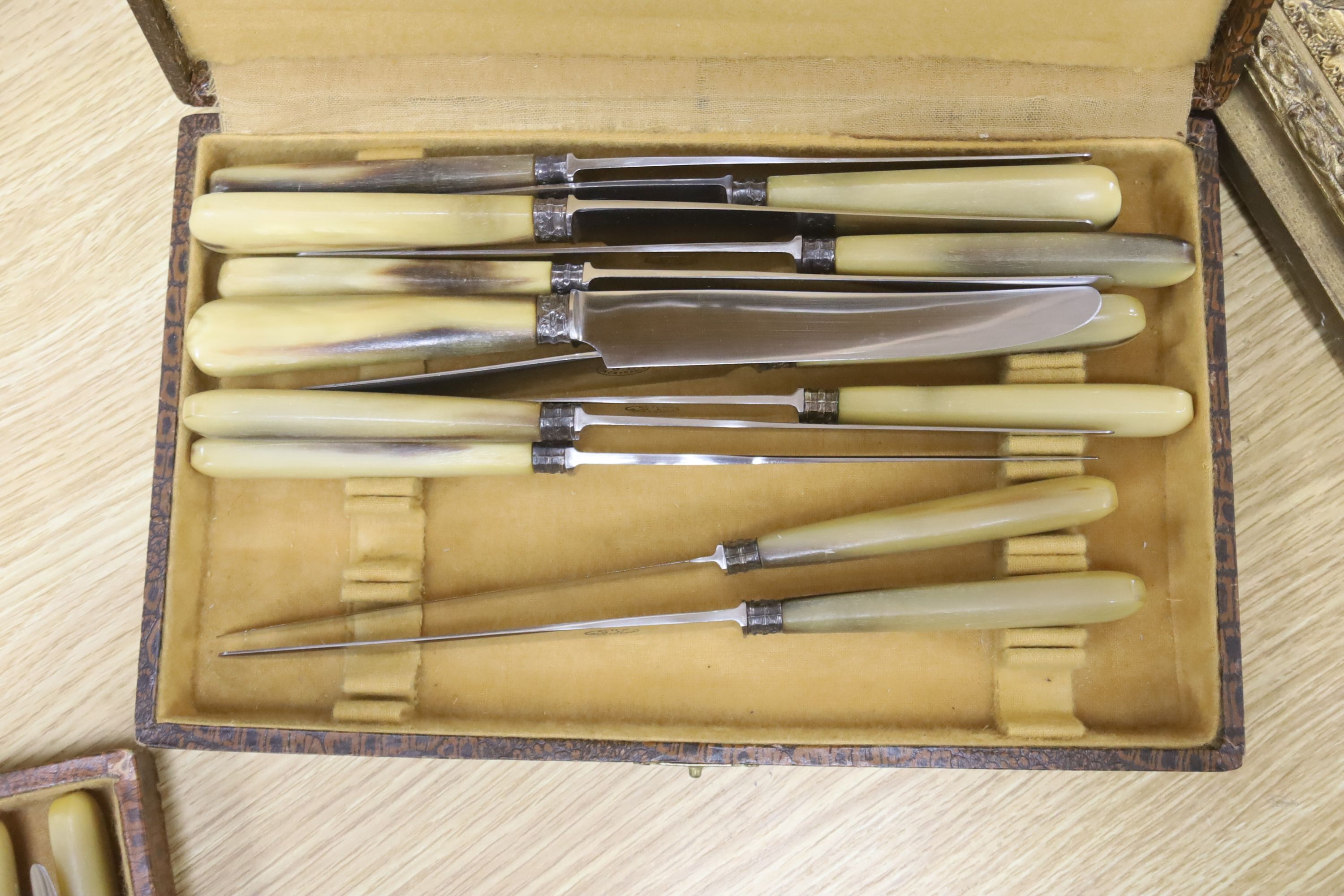 Three cased sets of horn handled flatware